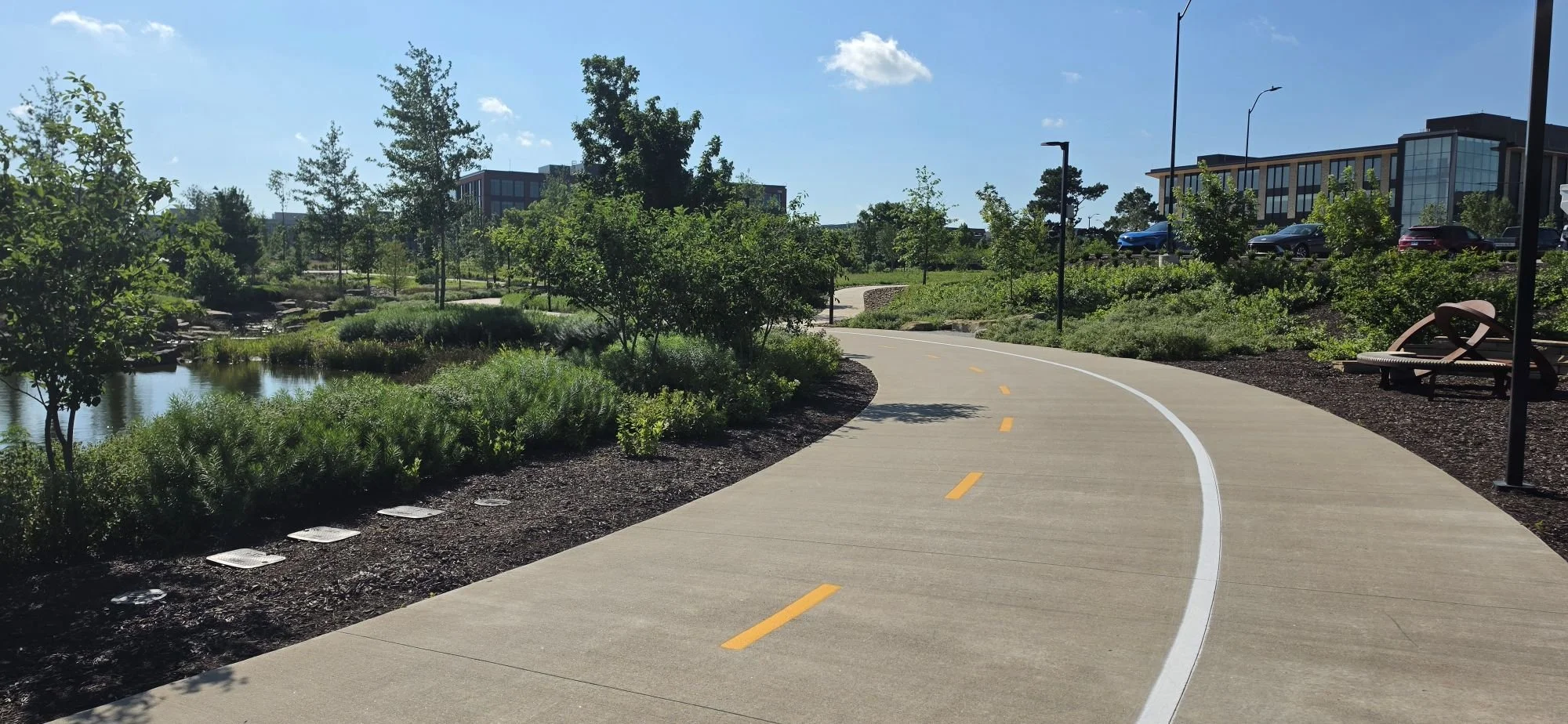 A view of the Razorback greenway as it flows through the Walmart Home Office Campus