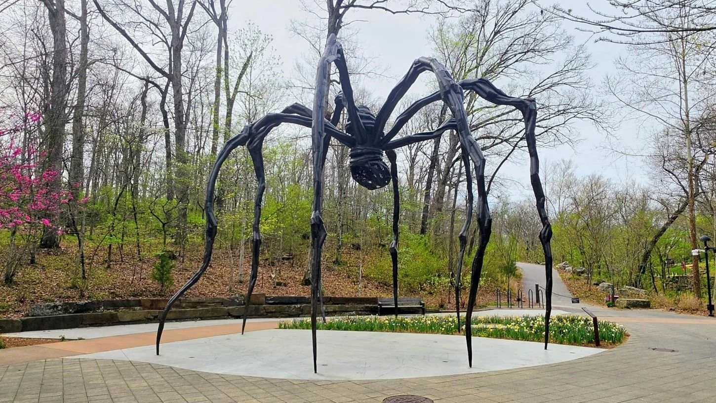 A giant 30 foot spider exhibit along the Art trail that is open and allows people to walk around and under the statue.