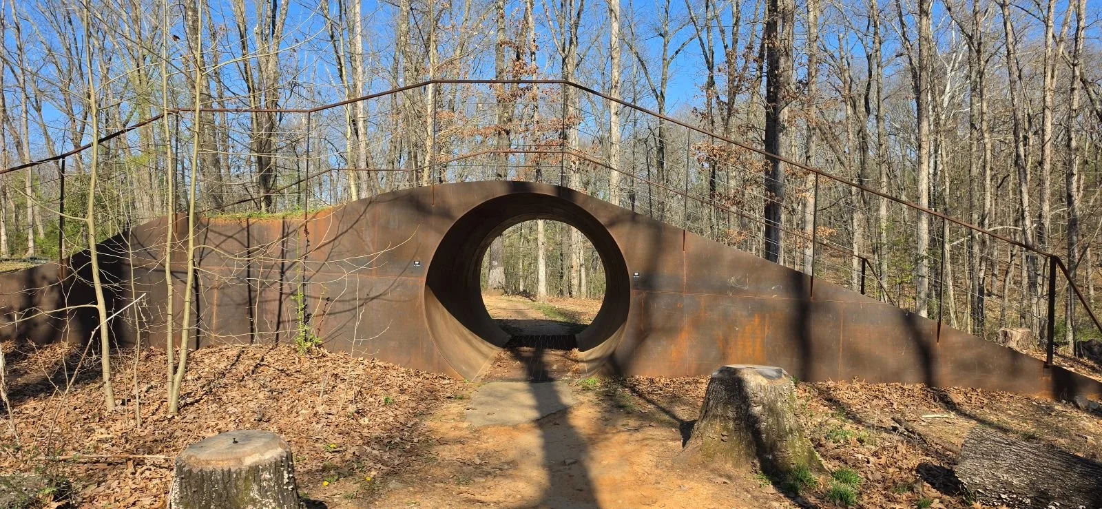 A picture of the tunnel that goes under Thunderdome at the end of Thunder Rolls Trail in  Coler MTB preserve in Bentonville Arkansas