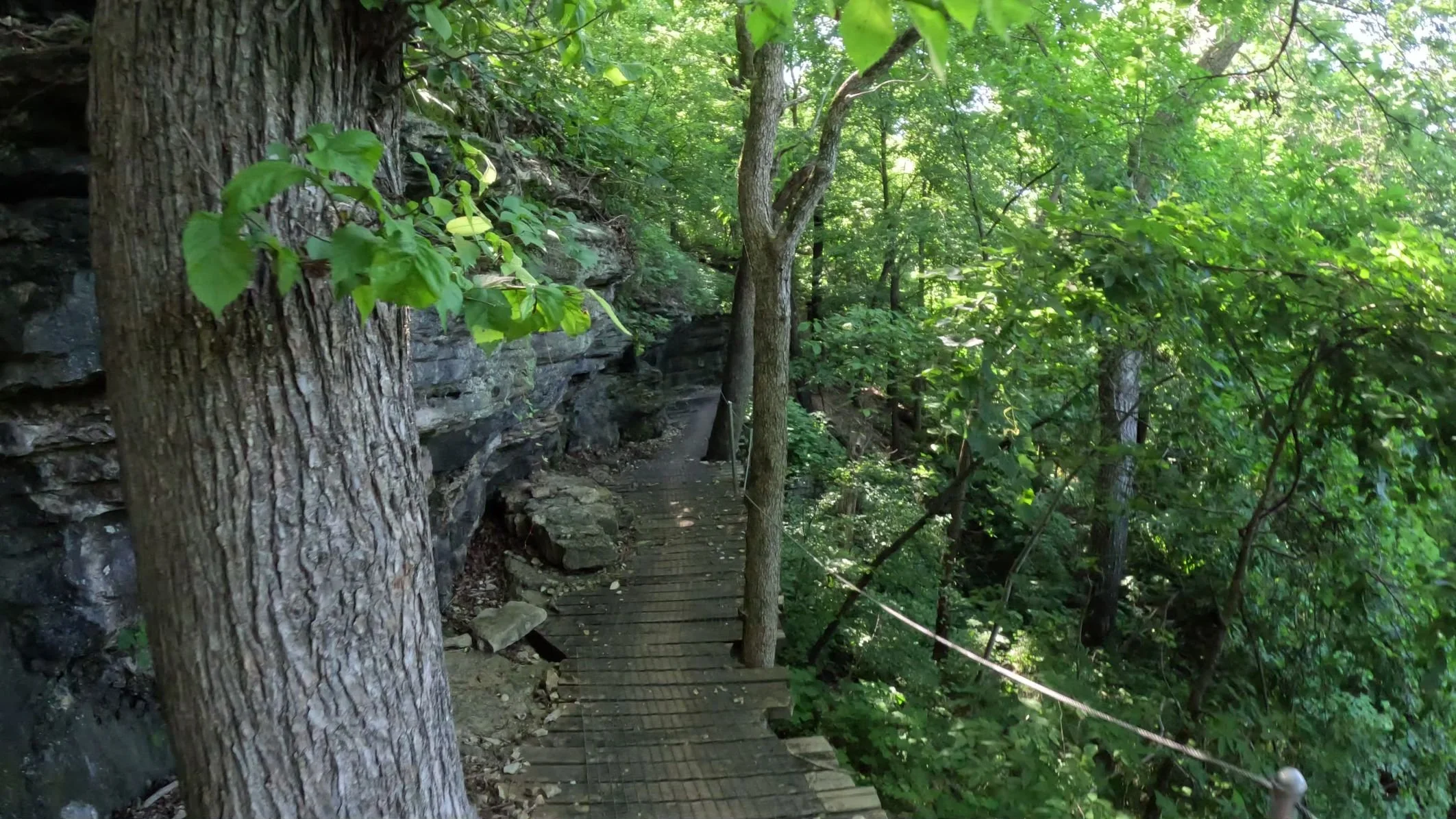 After the narrow rocky section is this wooden ramp that skirts the tall bluff