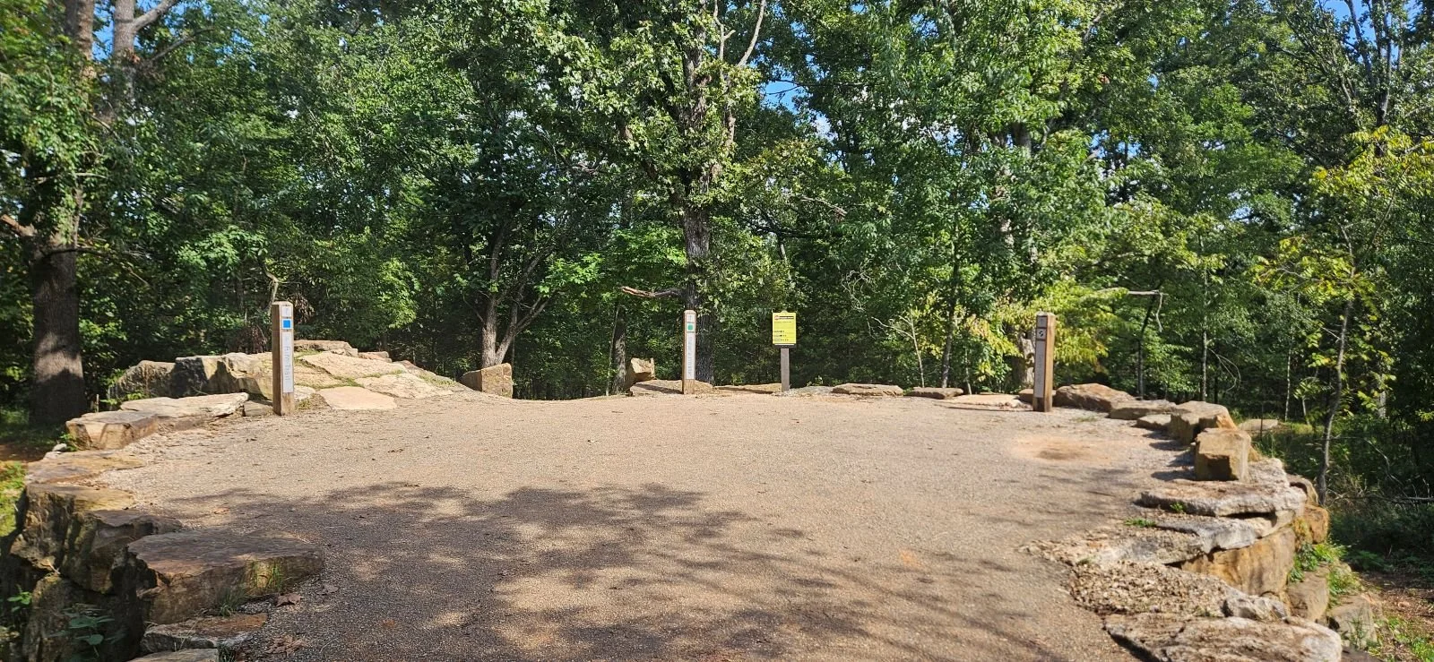 An Image of the Tech Hub in Slaughter Pen showing three differently rated trails 1. Rim Trail - Blue Rated 2. Walter's Whislter - Green Rated 3. Techgnar - Black Rated