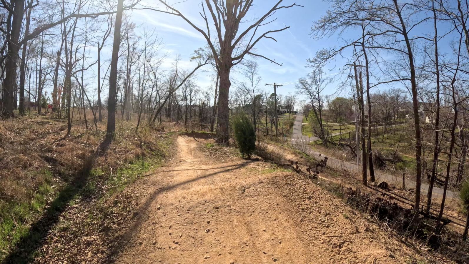A picture of a rollable tabletop and a berm on All American Trail before the pedestrian bridge in Slaughter Pen