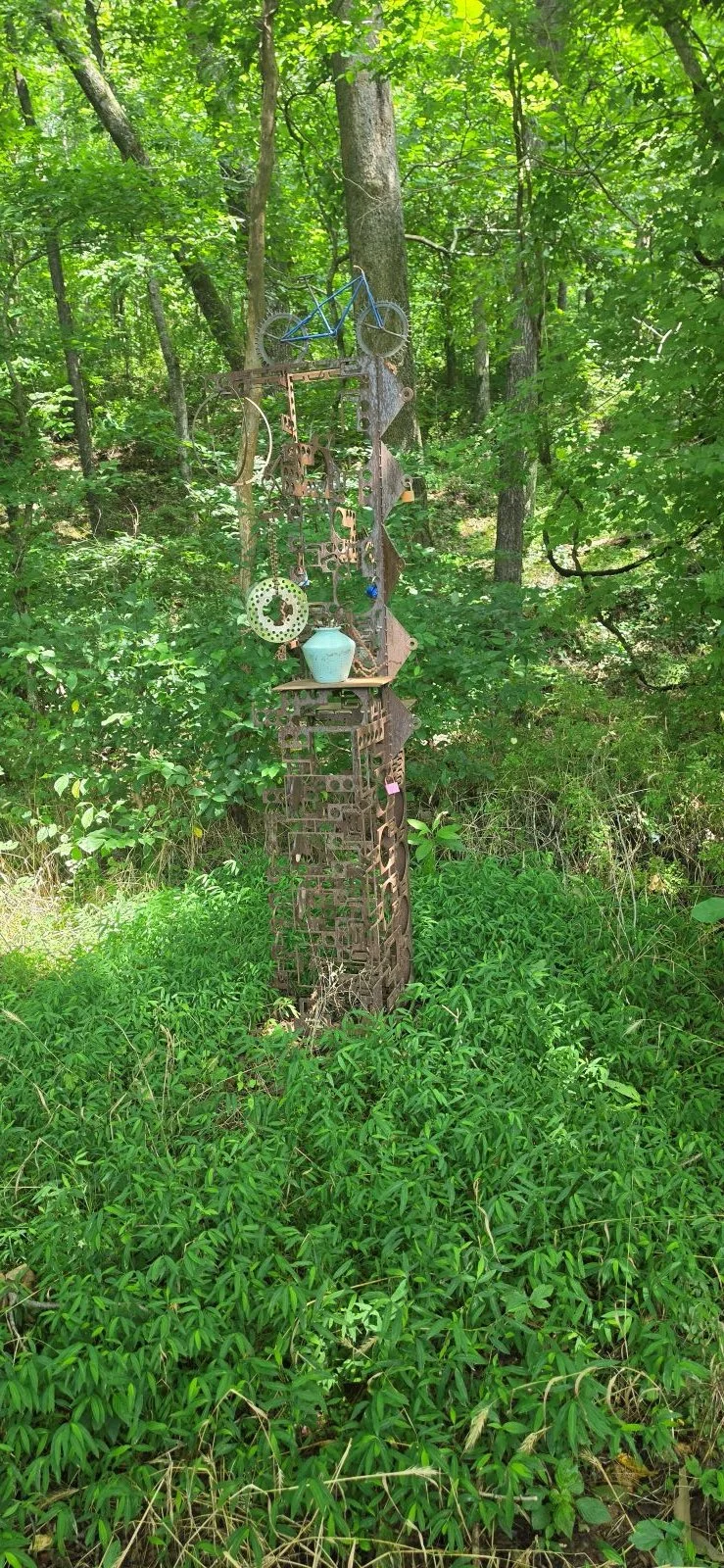 A Picture of one of the sculptures found along the Snowbird Trail. This on seems to be made with some bike parts and other metal pieces.