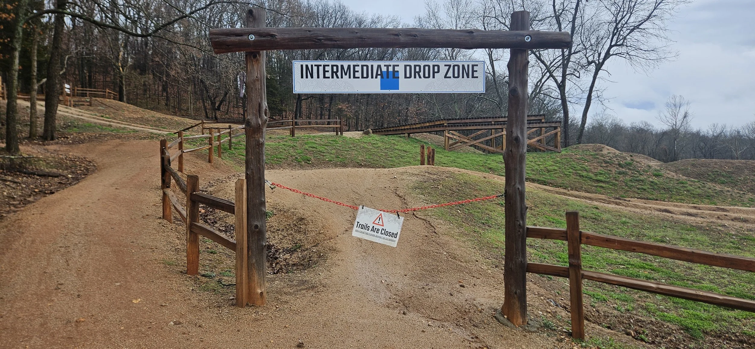 The Intermediate Drop Zone Gate with a Trails are Closed sign barring entry to this feature in the Skills Park in Slaughter Pen
