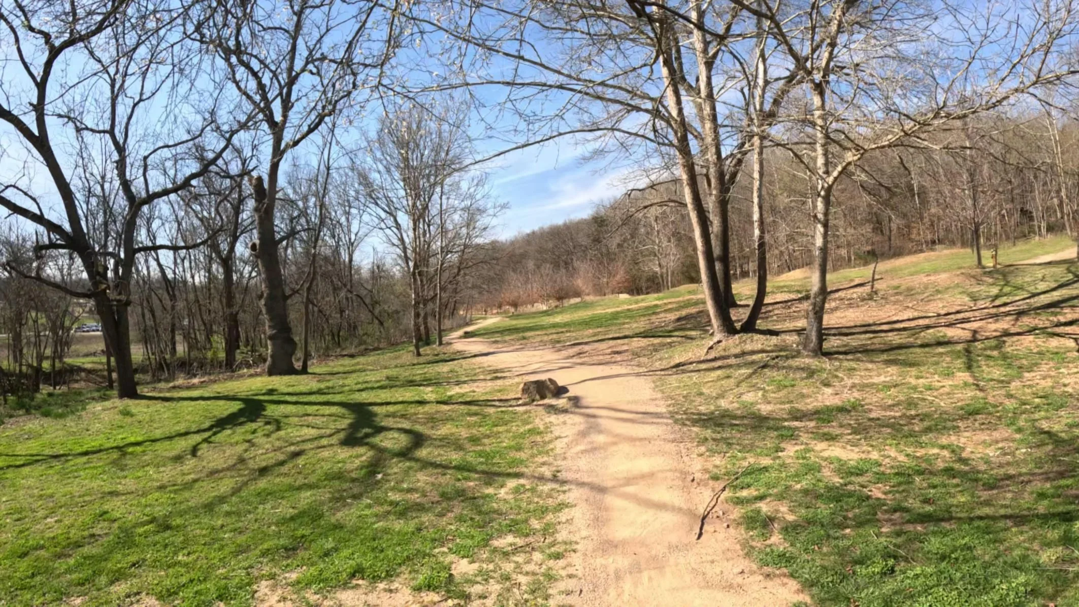 A picture of the flat singletrack after the outdoor fitness center in Slaughter Pen