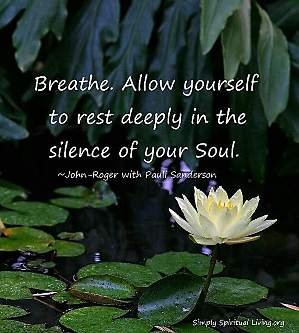 A water lily floating on a pond surrounded by green leaves with a spiritual quote about breathing and resting deeply in silence