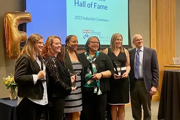 Group of people accepting award