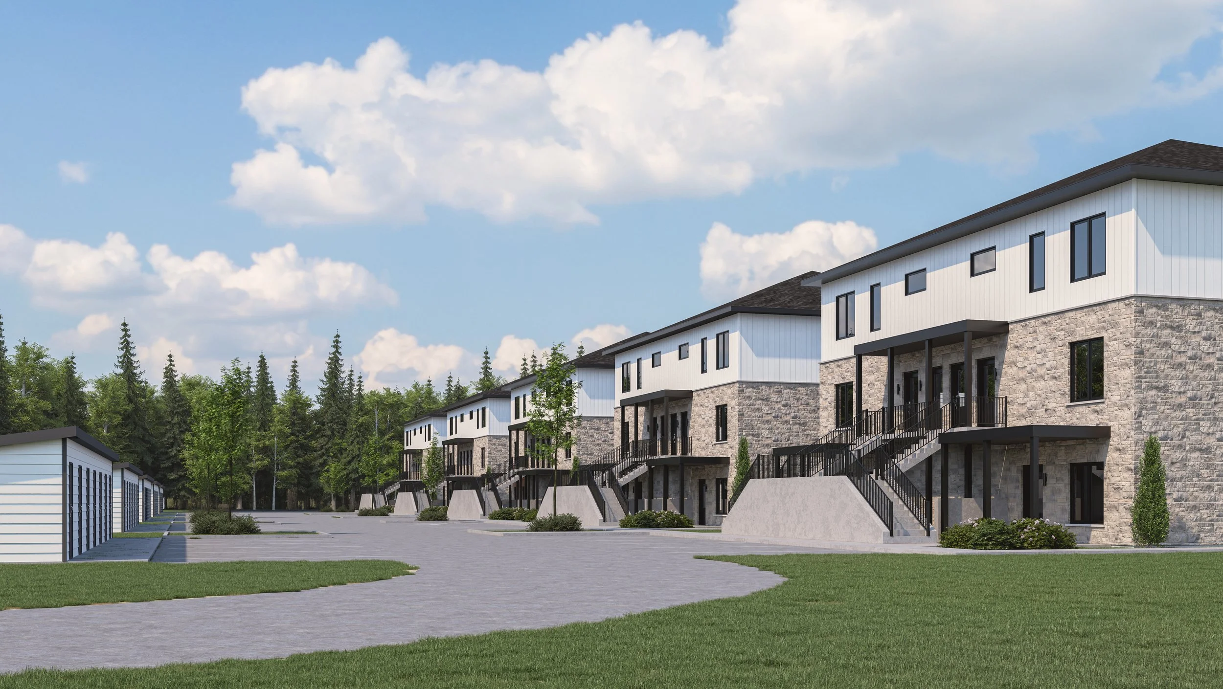 Newly constructed row of townhouses with stone and white siding exteriors, outdoor stairs leading to front doors, set against a backdrop of green trees and a partly cloudy sky.