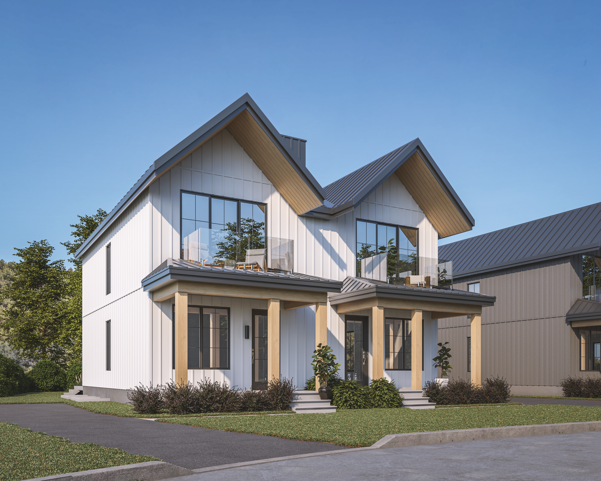 Modern two-story house with white vertical siding, large glass windows, and a small front porch with wooden columns. Green lawn and shrubbery in front, clear blue sky.