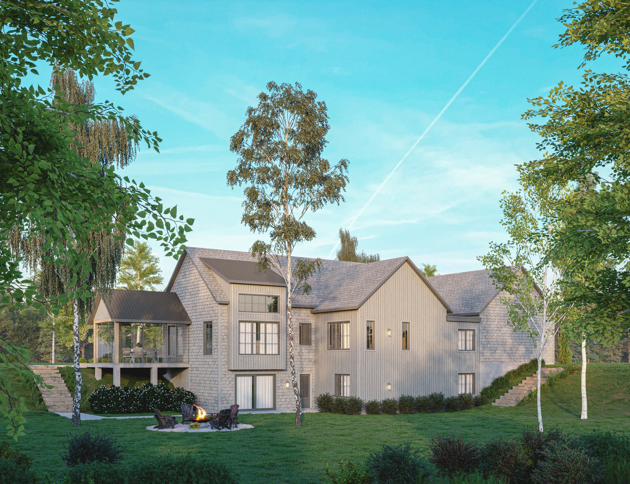 A modern two-story house with a fireplace and outdoor seating area in a green yard surrounded by trees under a blue sky.