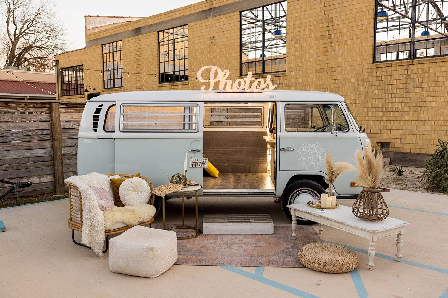 An intimate same-sex wedding ceremony featuring two brides. Hiring our Mobile Vintage Gypc Wagen Photo Booth