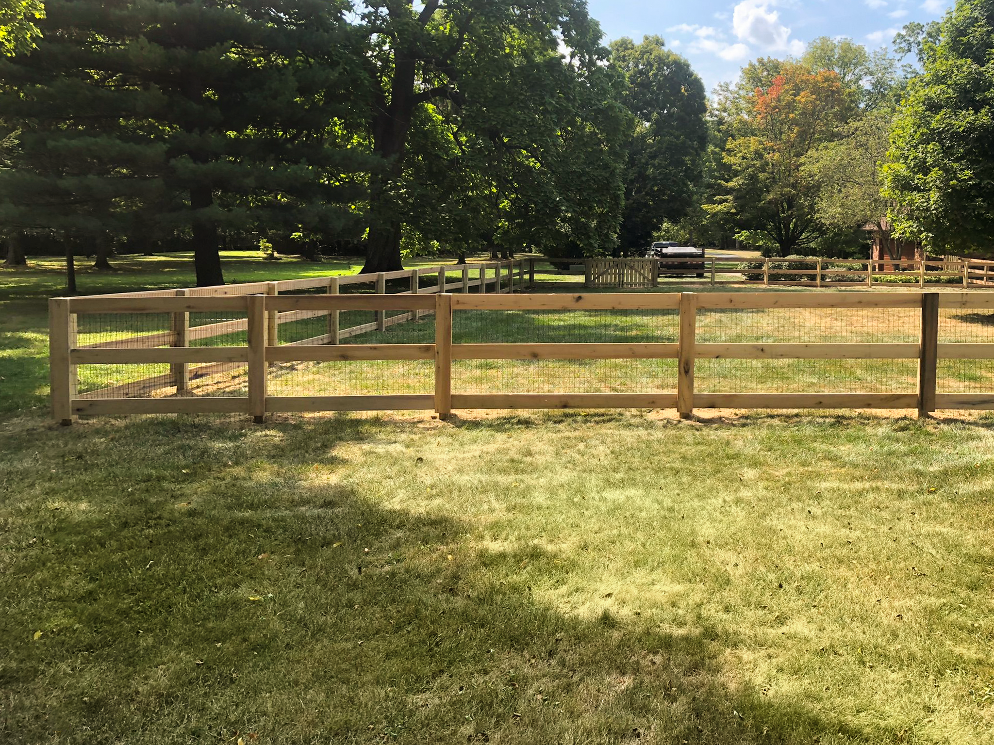 Kentucky Board Fence with Black Welded Wire