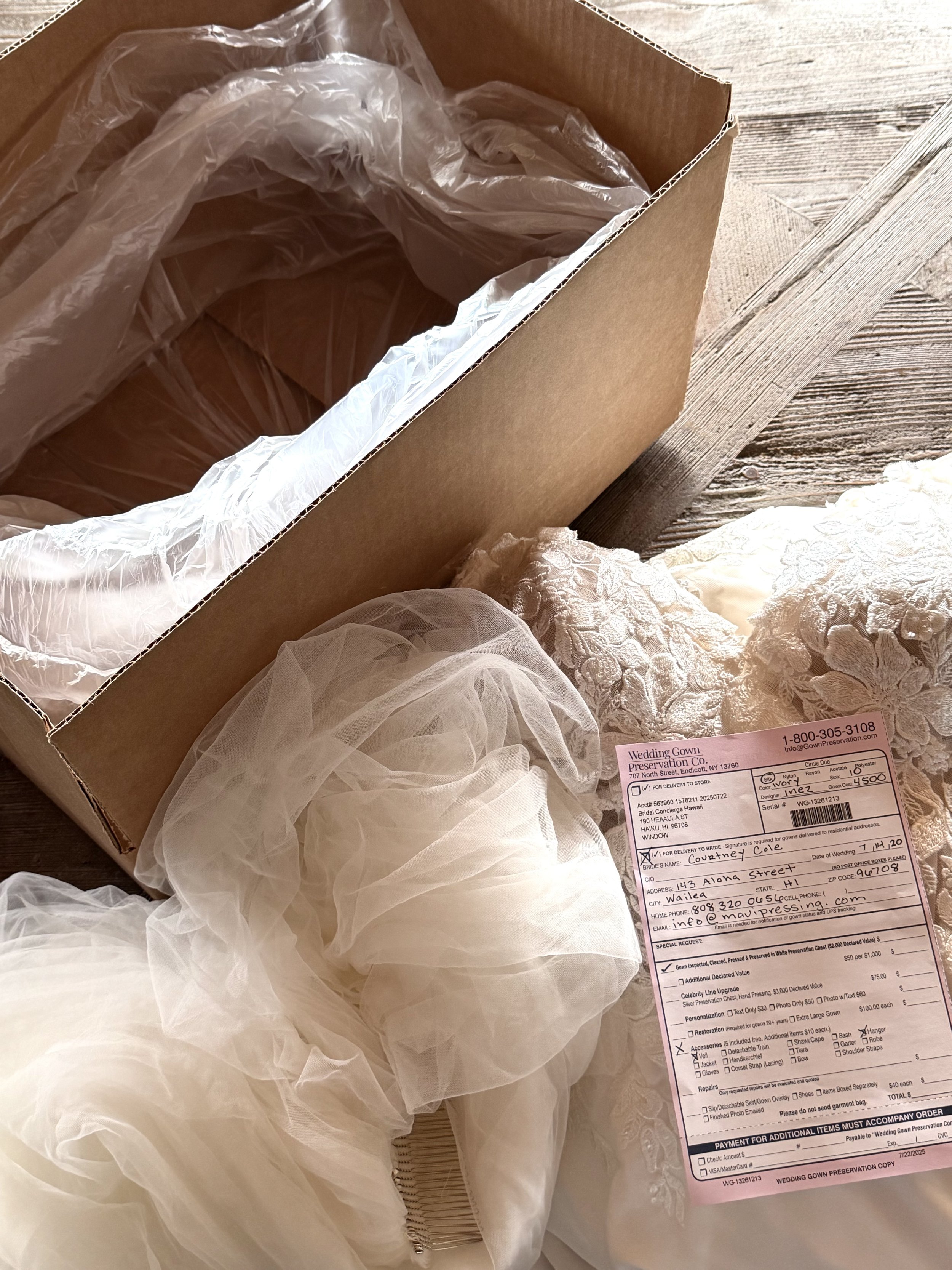 Step 4 - Package your wedding dress and accessories in the plastic dress bag, inside your box of choice.