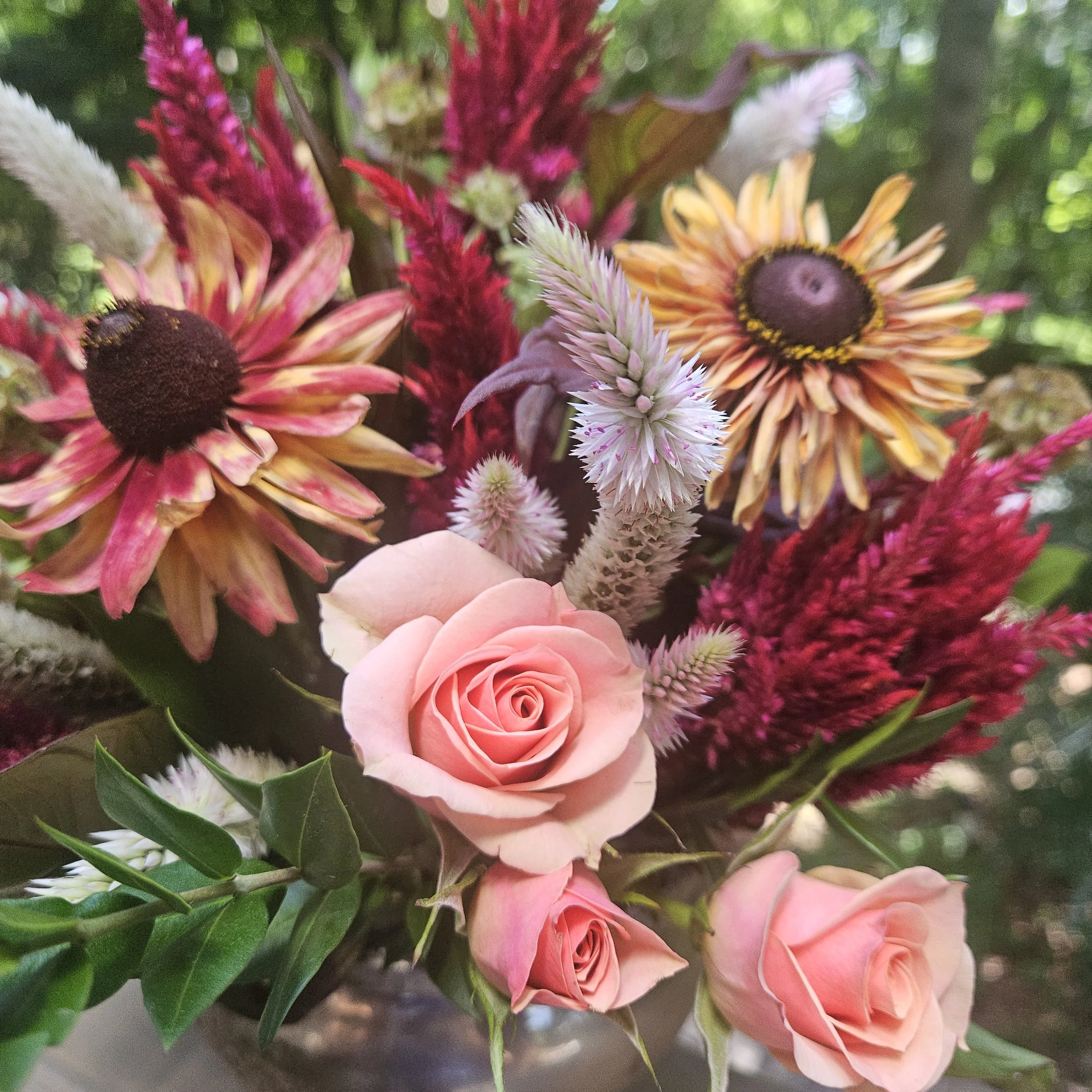 Mixed bouquet of flowers in bright summer colors