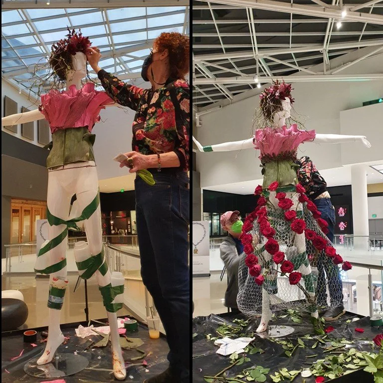 Professional florists using eco-friendly mechanics for floral art installation