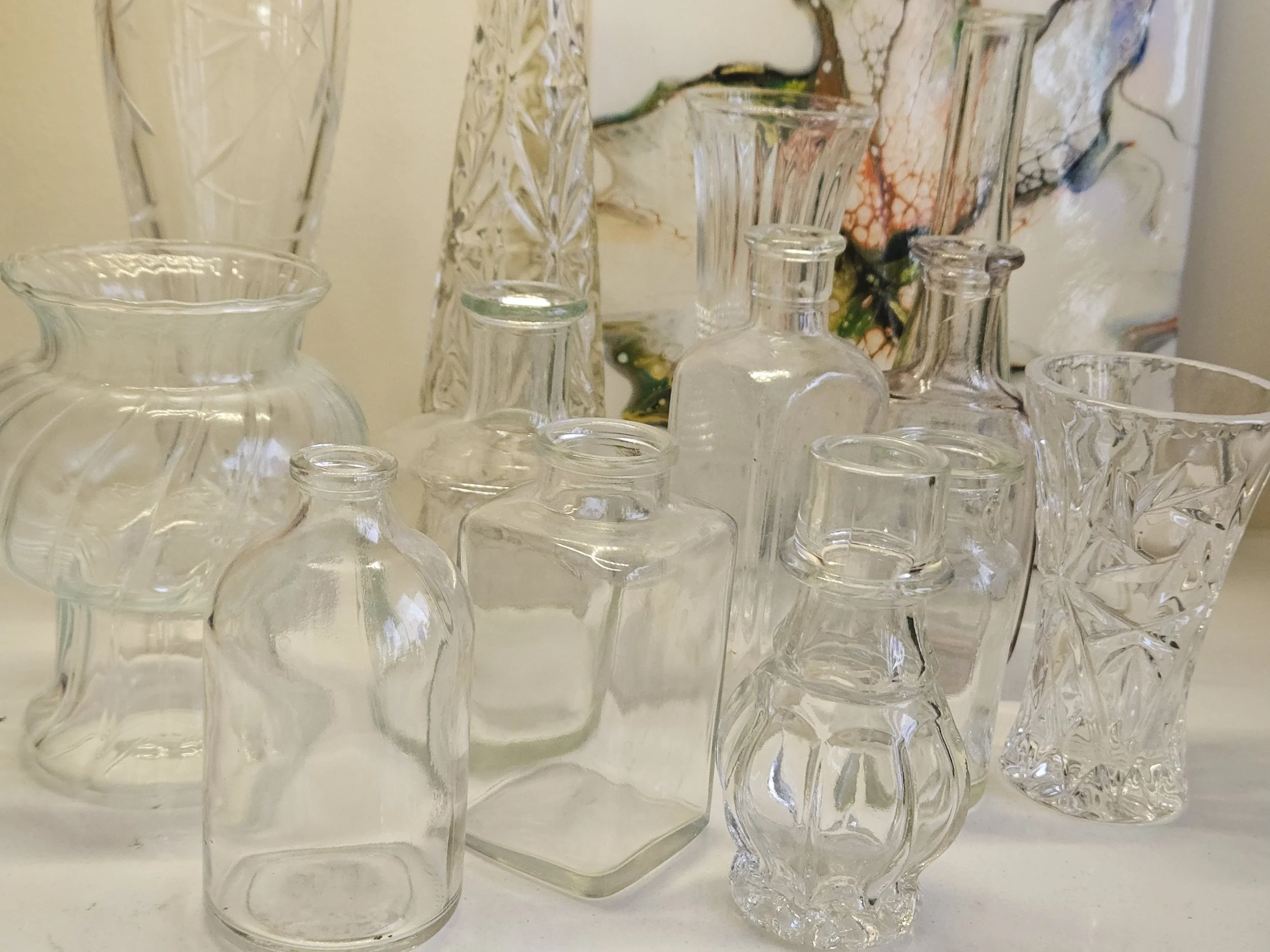 Sustainable floral design mechanics of thrifted vases.