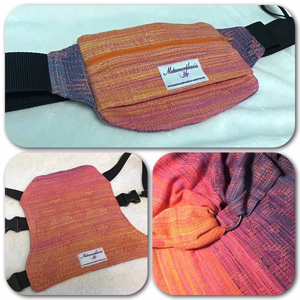 Colorful fabric mask and pouch with a small tag that reads 'Metamorphosis' and a website URL, in shades of orange, pink, and purple.
