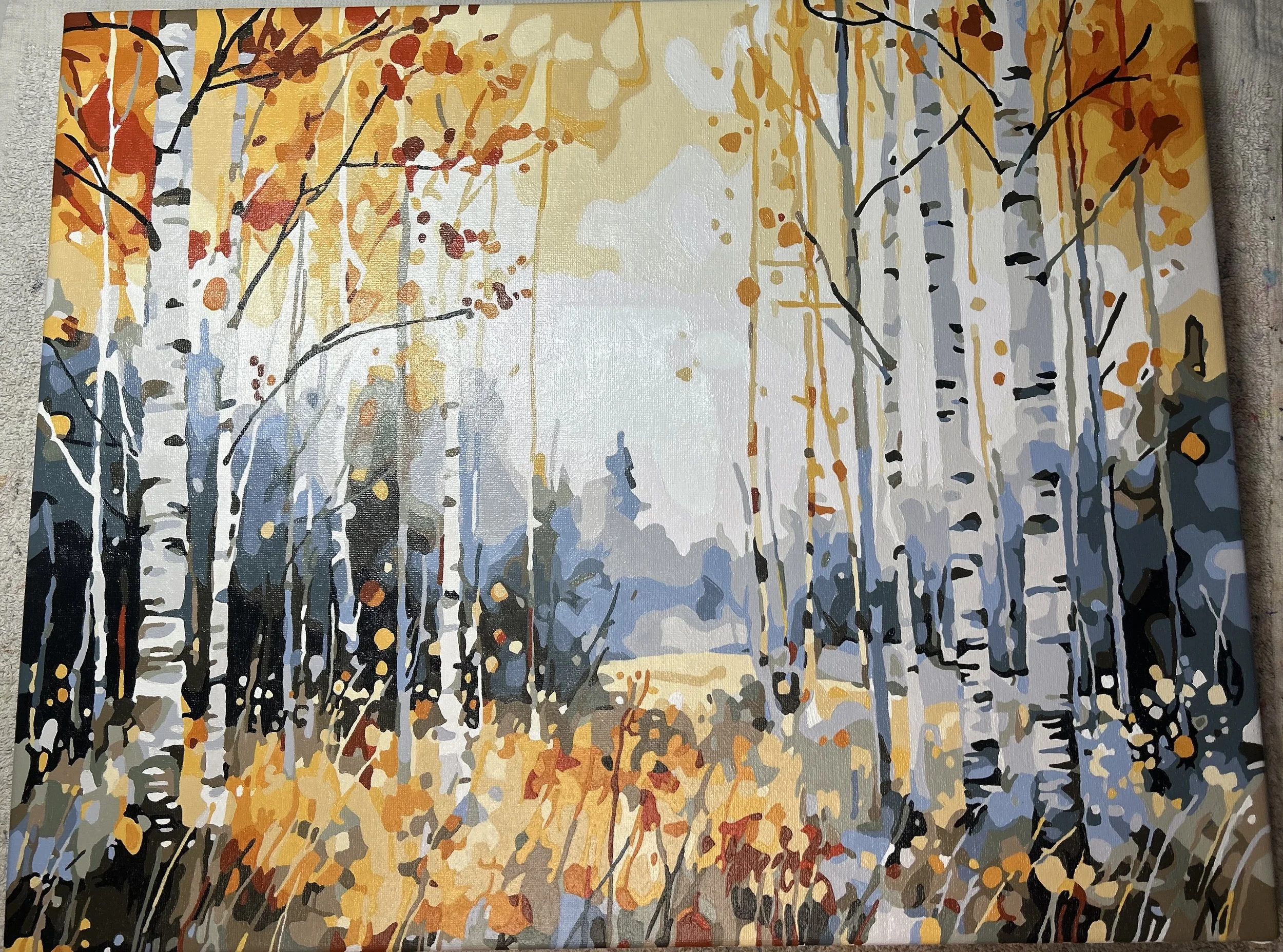 A painting of an autumn forest with white and gray birch trees, orange and red leaves, and a light misty background.