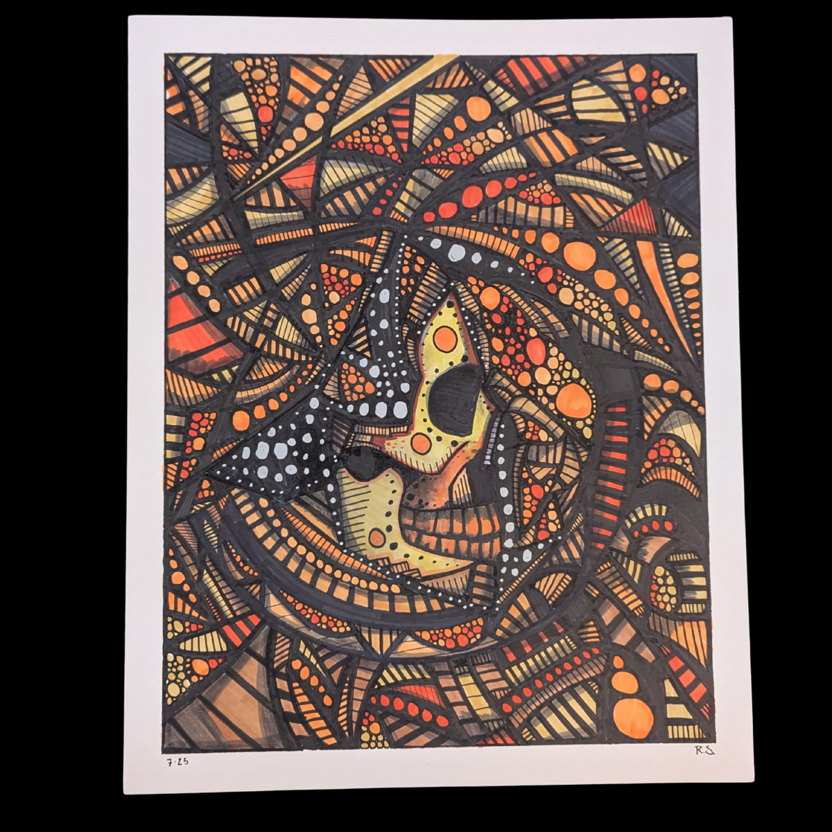 A colorful abstract artwork featuring geometric shapes, lines, and dots in shades of orange, yellow, black, and red, forming a pattern reminiscent of a face or skull.