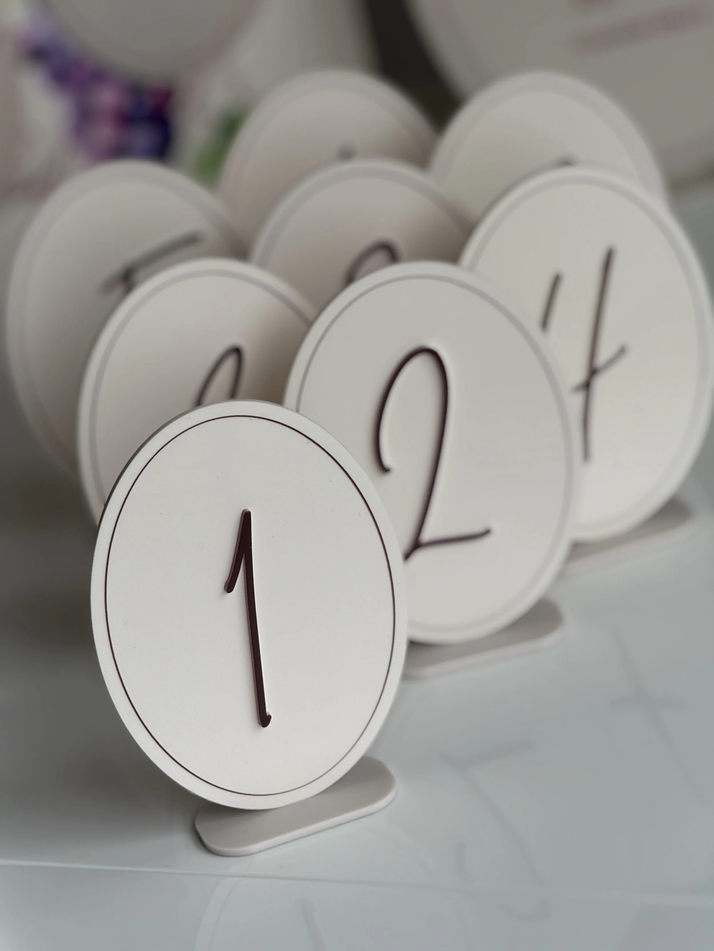 White circular clocks with black hands showing 1:00, 2:00, 3:00, and 4:00.