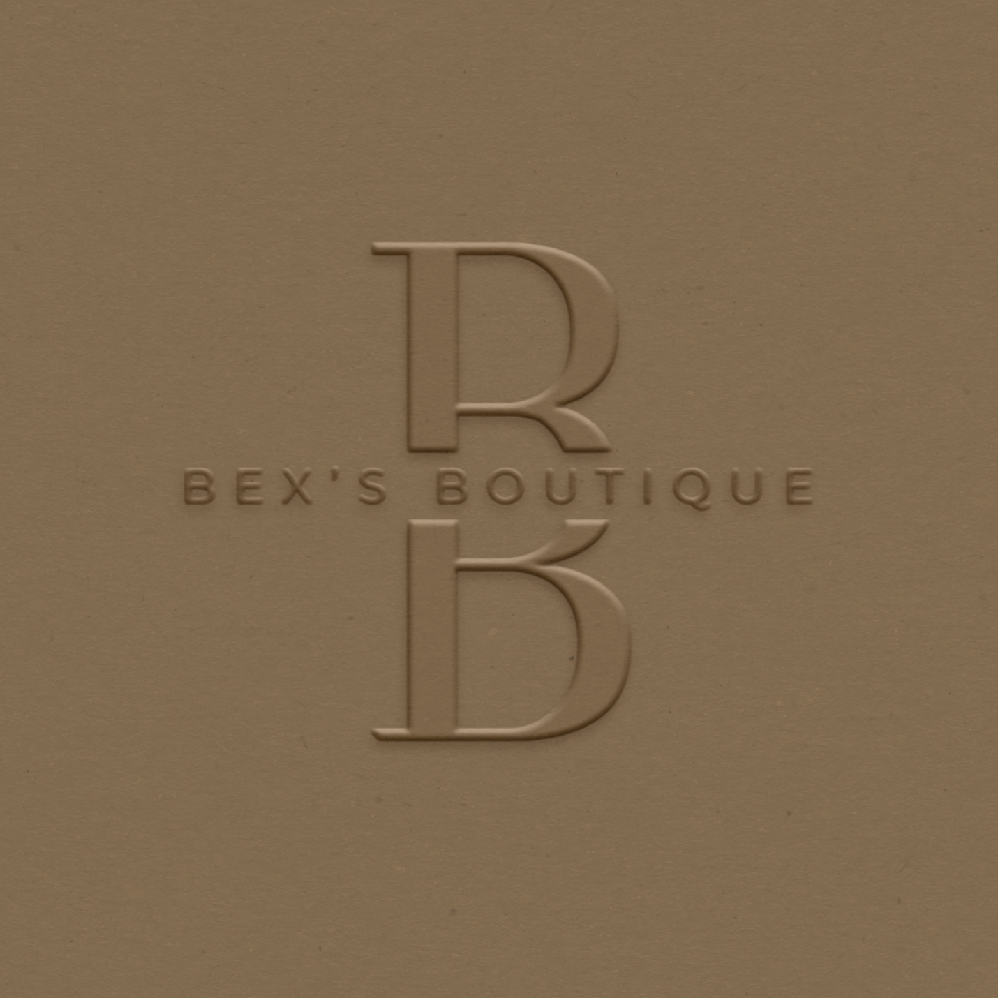 Embossed logo on tan surface with large 'B', with small 'BEX'S BOUTIQUE' text between the two 'B's'.