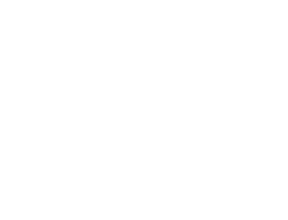Outline of a person in a suit with a tie and a circle representing the head, set against a black background.
