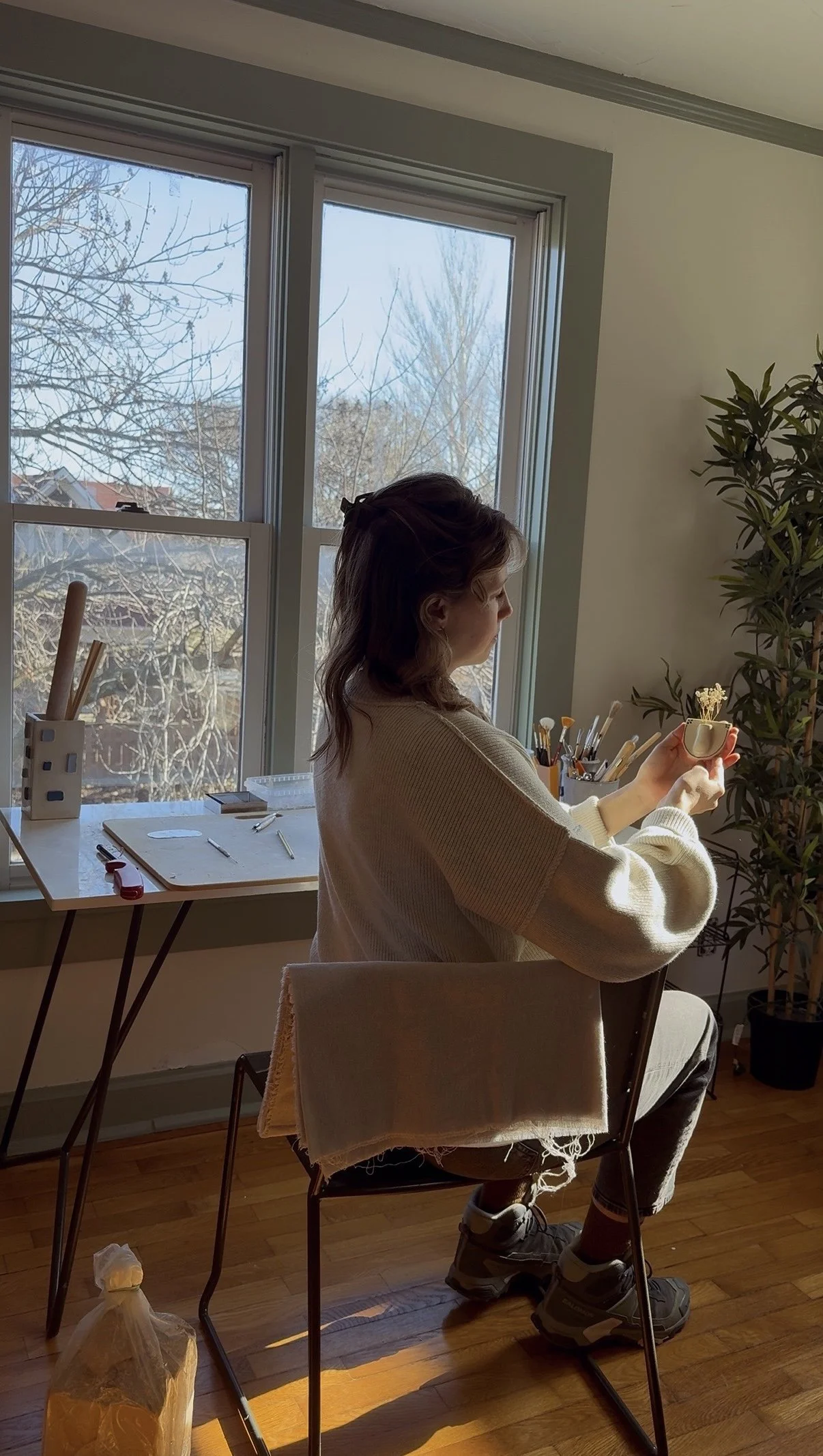 Girl with ceramic handmade piece