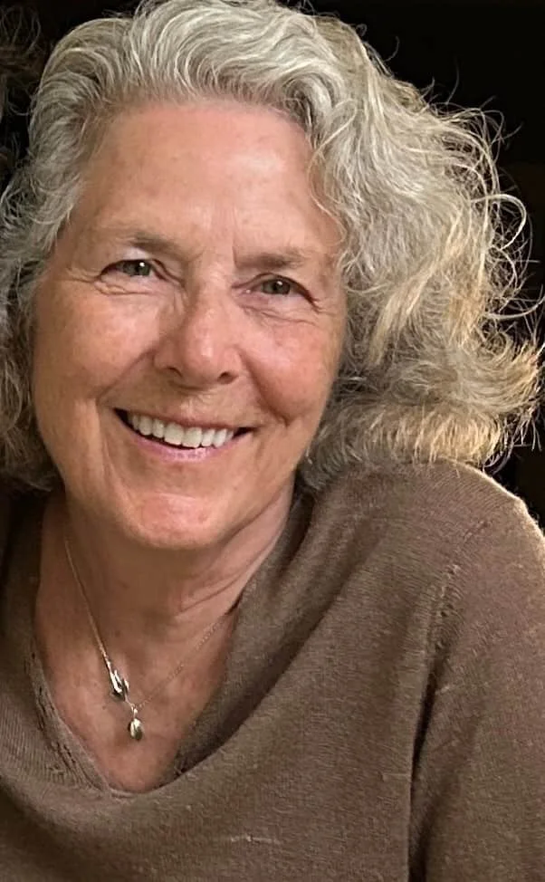 headshot of Anne