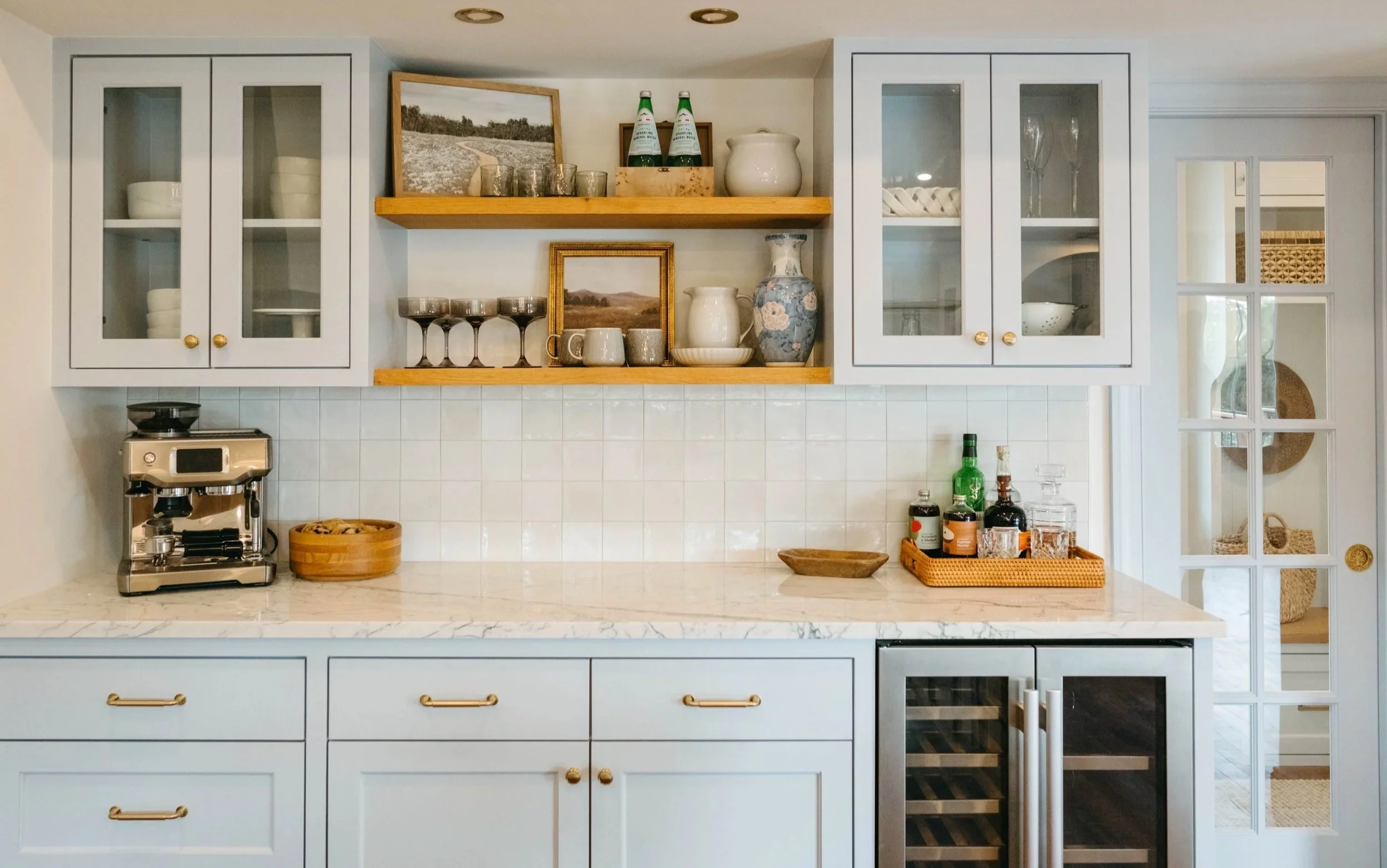 Custom cabinetry with beverage center.