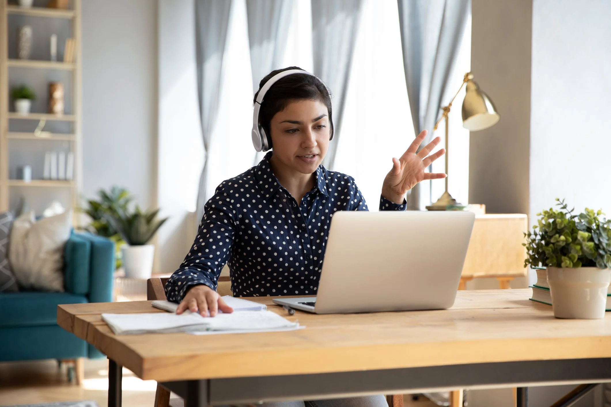 A BIPOC woman in family systems online therapy