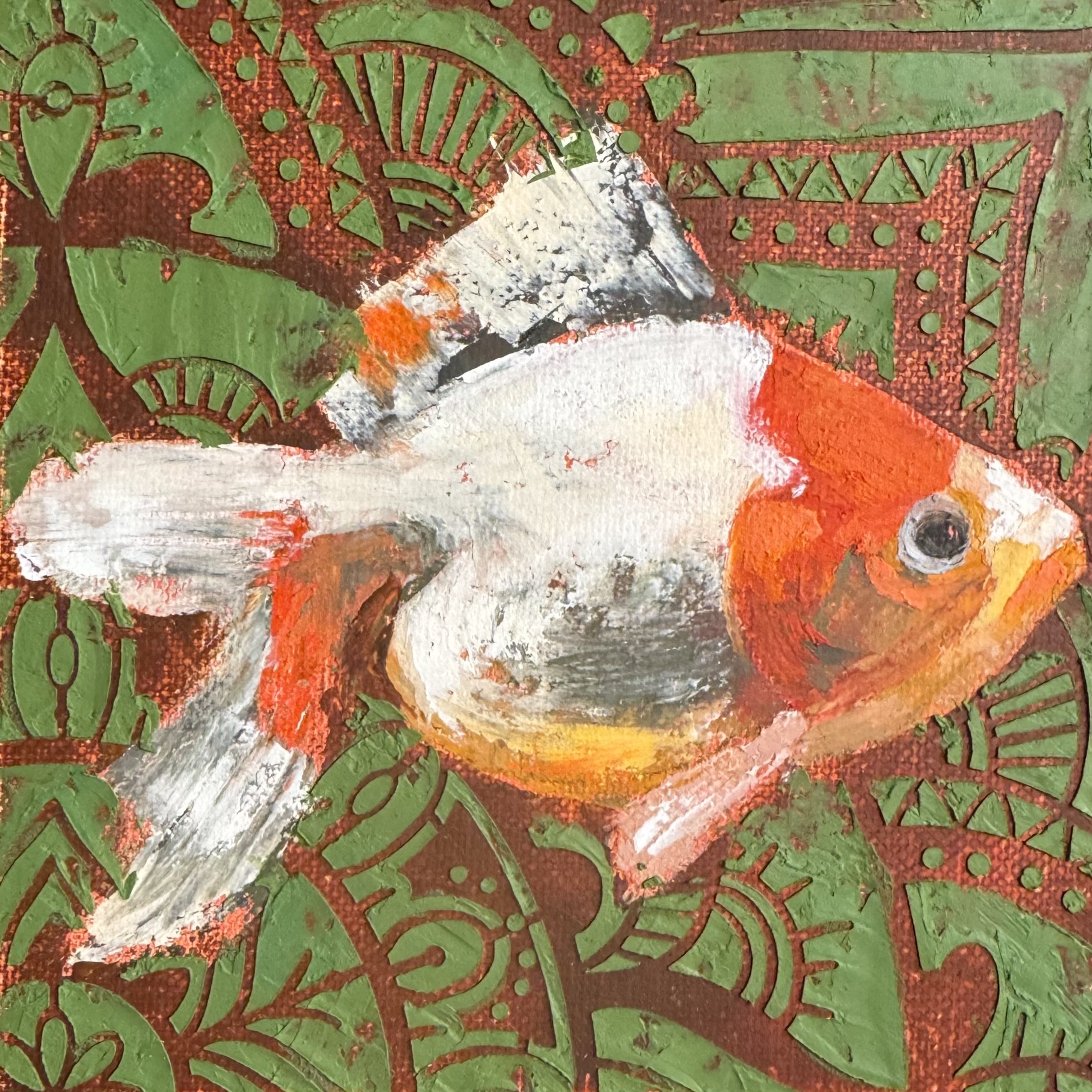 A painted illustration of a fish with a white and orange body, orange head, and large black eye, set against a green and red patterned background.