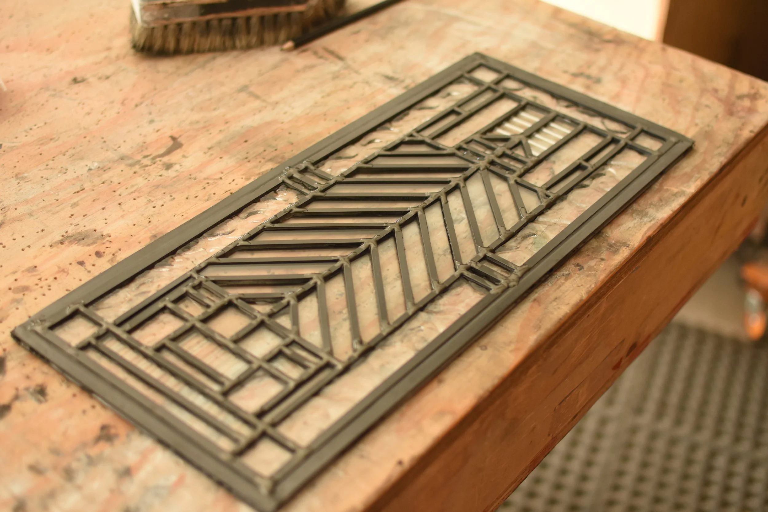 Leaded glass window fabricated with geometric pattern