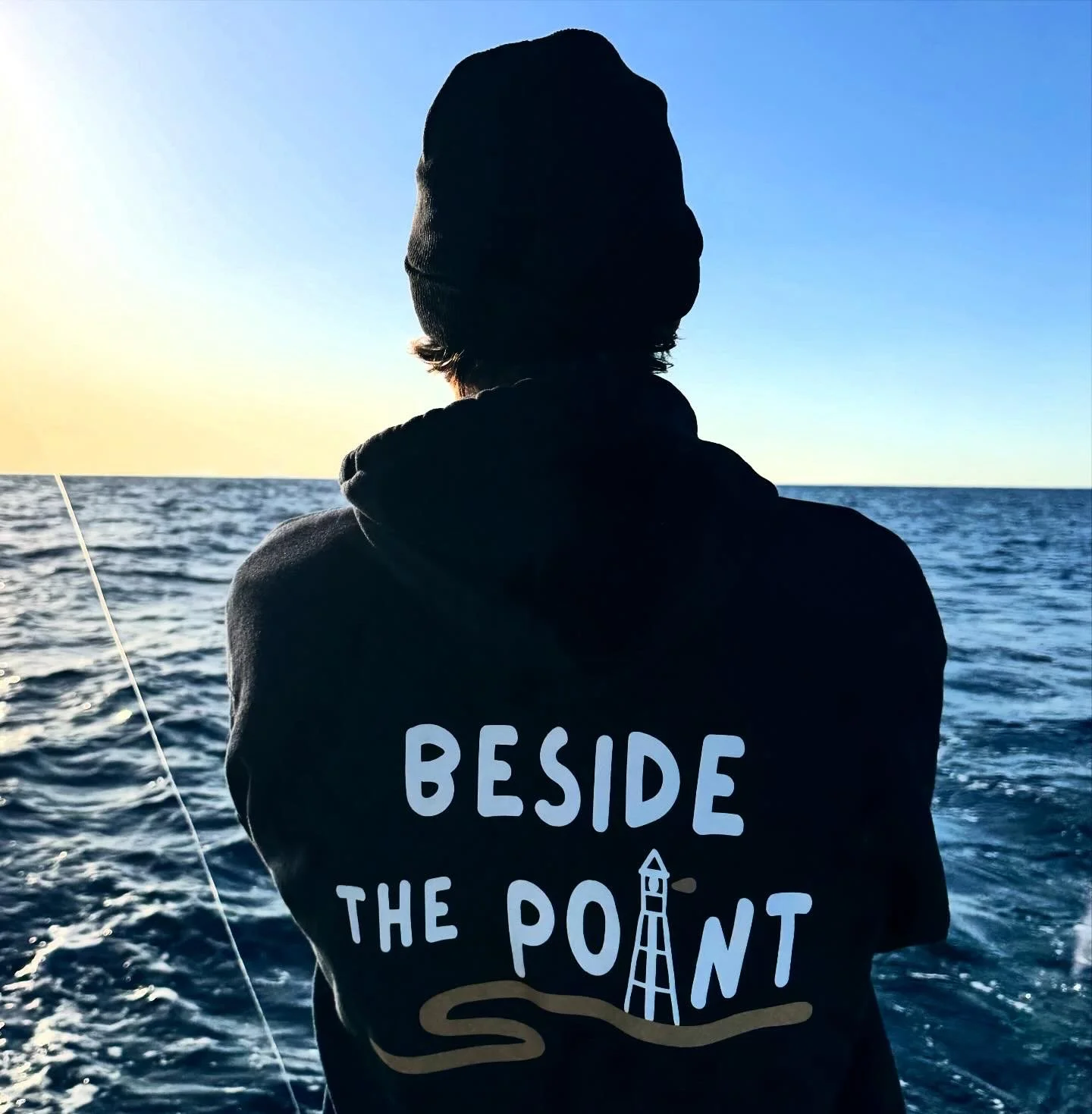 Beside The Point Beanie backside on the ocean