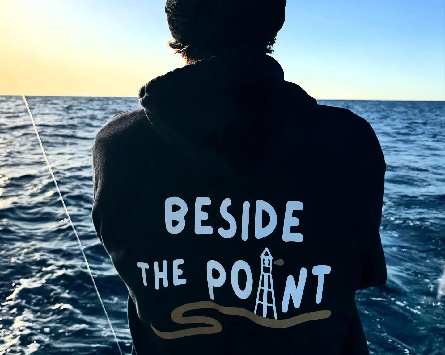 Fisherman wearing Beside The Point Products