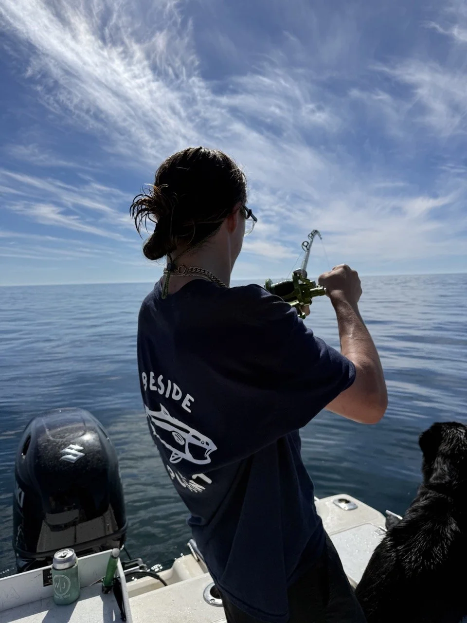 Yellowtail tee back on an angler.jpeg
