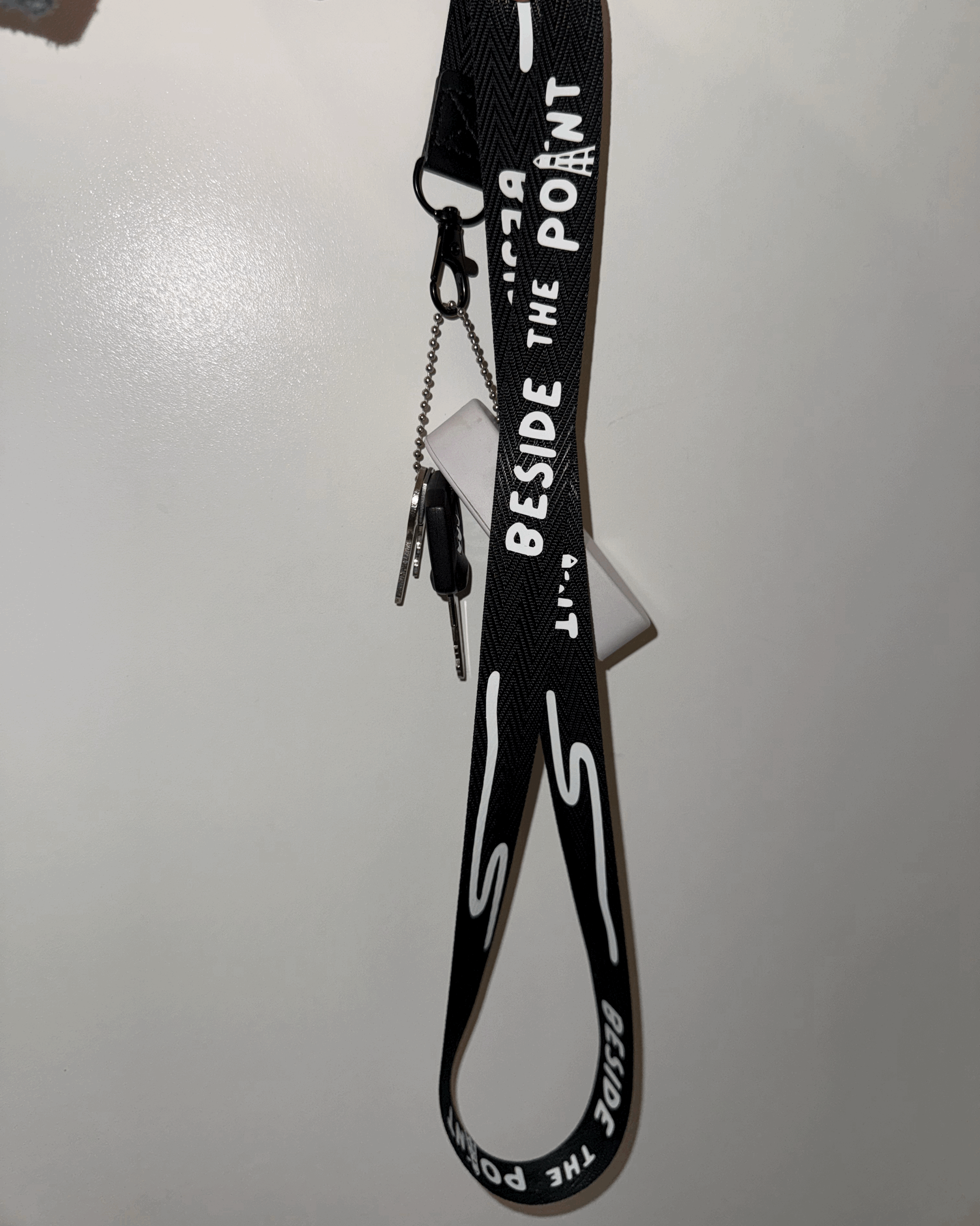 beside the point keychain