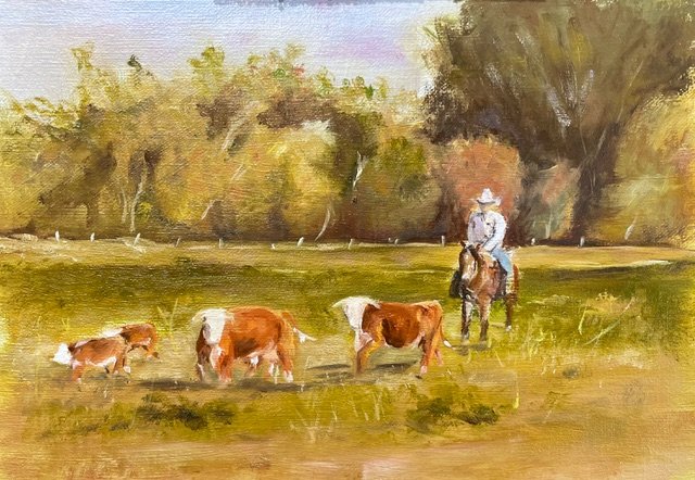 A painting of a cowboy on horseback herding three calves in a grassy field with trees in the background.