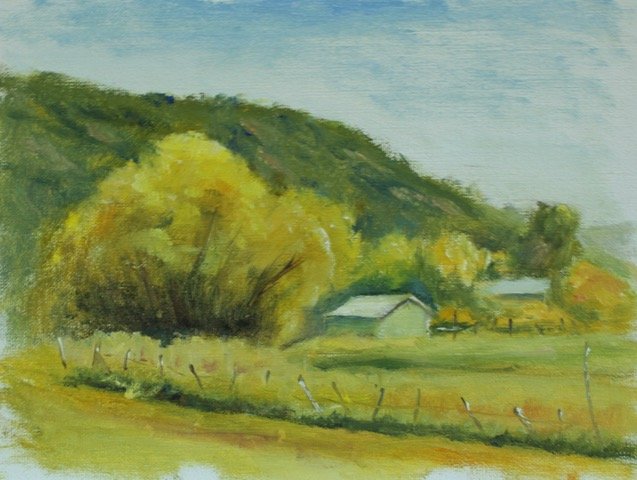 A watercolor painting of a rural landscape with trees, a barn, and a fence near rolling hills under a blue sky.