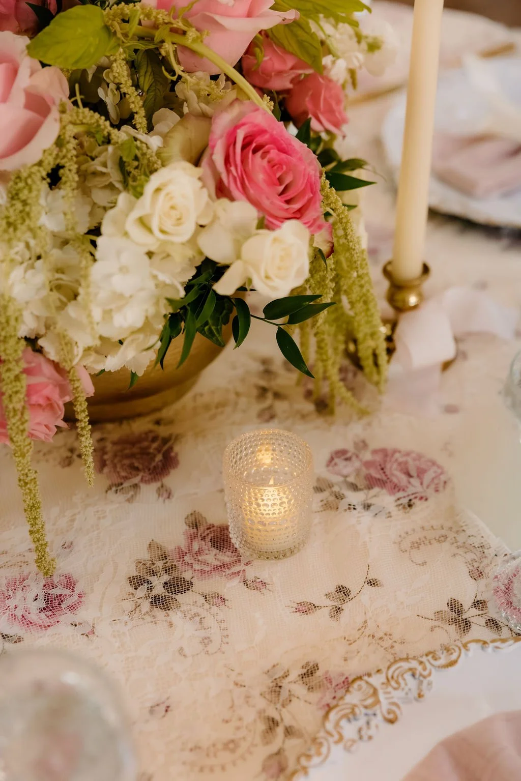A breathtaking display of luxury wedding florals by Blooms by Tesla for a high-end celebration in Alpine, Utah. This design features a lush, romantic blend of creamy white roses, soft blush peonies, and delicate sweet peas, creating a timeless pink a