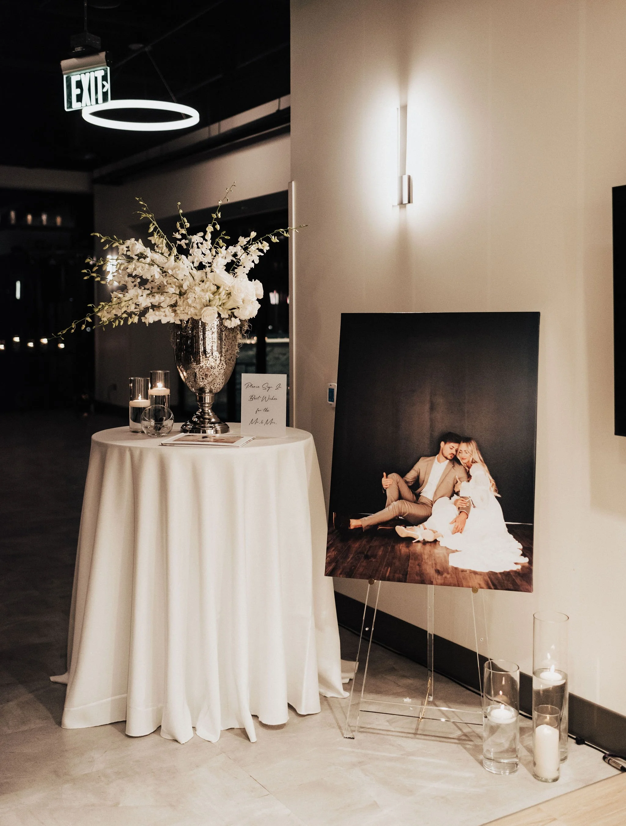 wedding-welcome-table-floral-urn-display.jpg