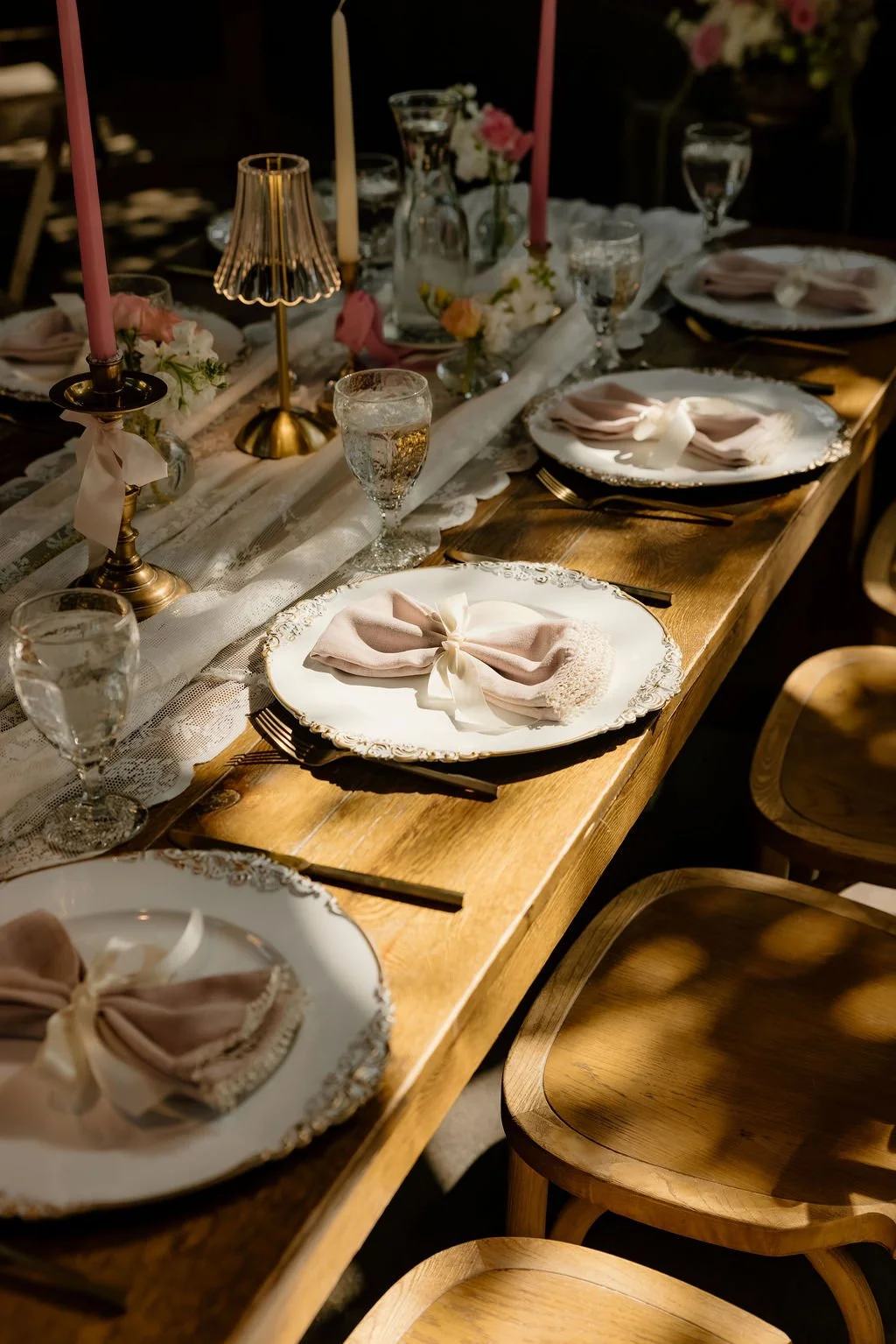 A breathtaking display of luxury wedding florals by Blooms by Tesla for a high-end celebration in Alpine, Utah. This design features a lush, romantic blend of creamy white roses, soft blush peonies, and delicate sweet peas, creating a timeless pink a
