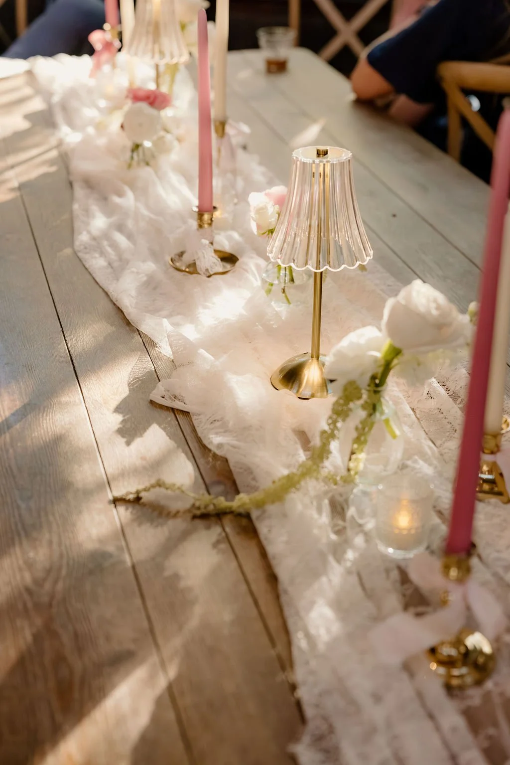 A breathtaking display of luxury wedding florals by Blooms by Tesla for a high-end celebration in Alpine, Utah. This design features a lush, romantic blend of creamy white roses, soft blush peonies, and delicate sweet peas, creating a timeless pink a