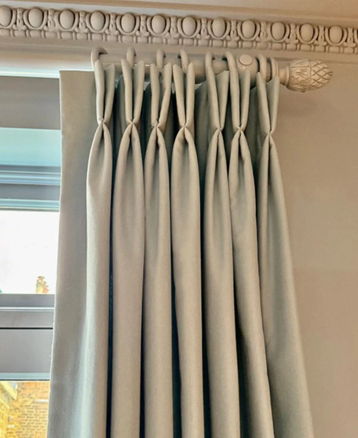 Handmade bespoke double pinch pleat lined curtains in plain from Jane Clayton. Installed on bespoke painted wooden poles from Hunter & Hyland.