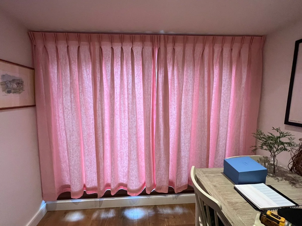 Handmade bespoke unlined double pinch pleat curtains in linen from The Cloth Shop.