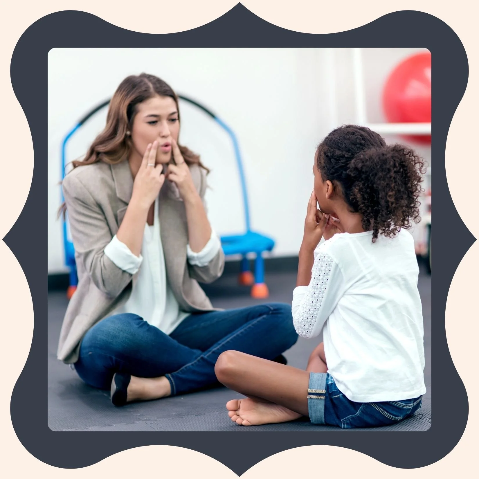 Adult woman and young girl sitting on the floor facing each other, both making facial expressions and gestures during a conversation or activity.