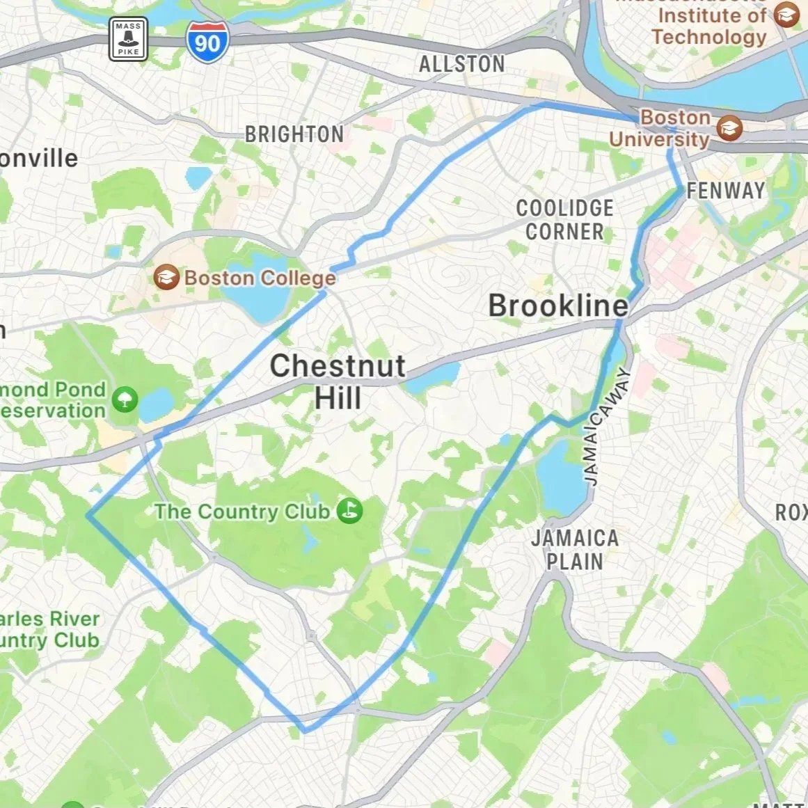 Map of Brookline, Massachusetts, showing neighborhoods like Chestnut Hill, Coolidge Corner, and Jamaica Plain, with landmarks such as Boston College, Boston University, and The Country Club, along with parks and green spaces indicated by green areas.