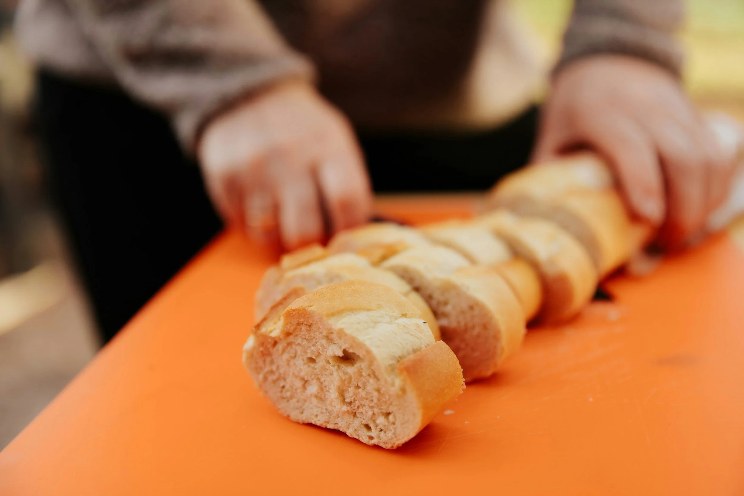 Bread being cut.