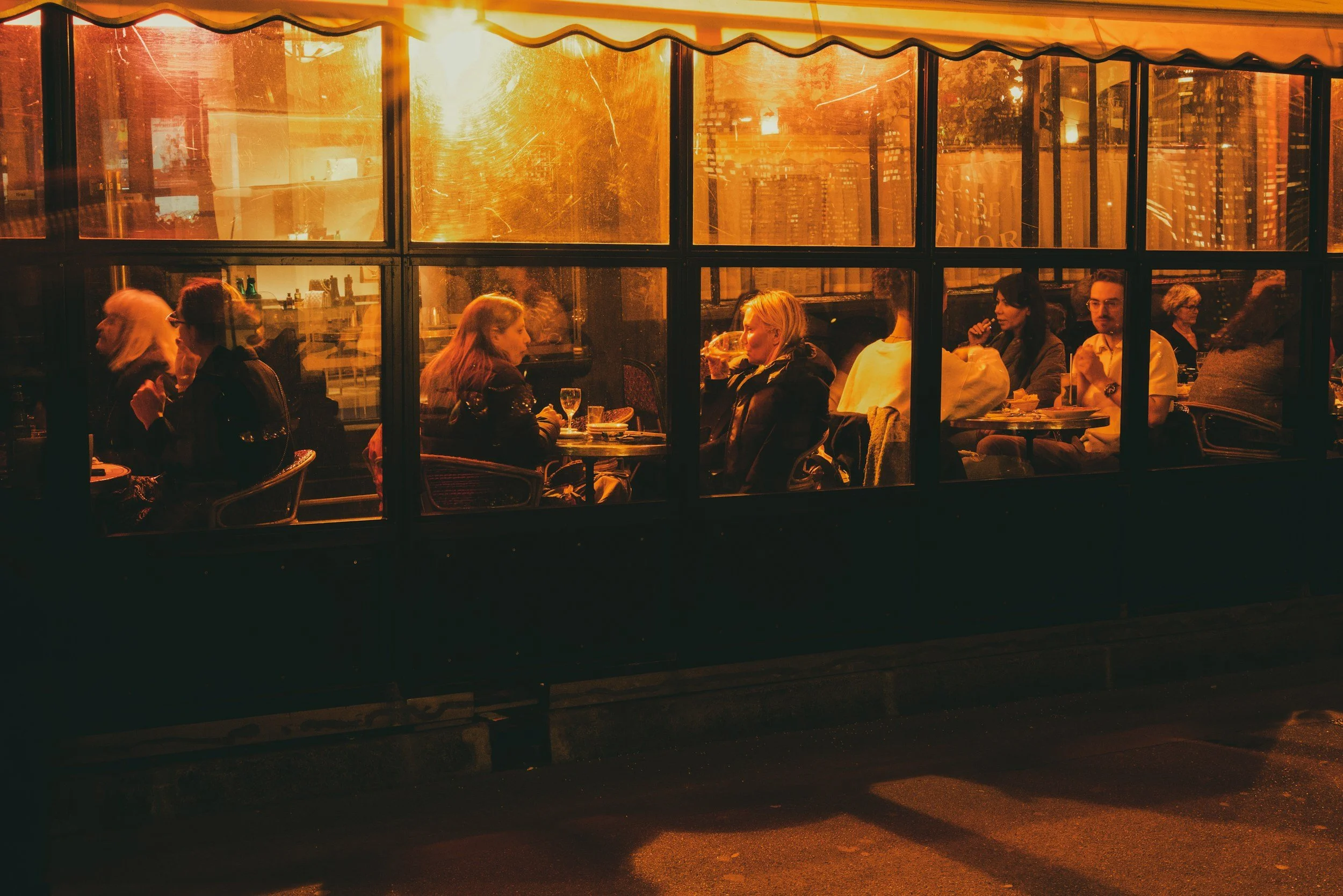 Restaurant scene, looking in from the outside