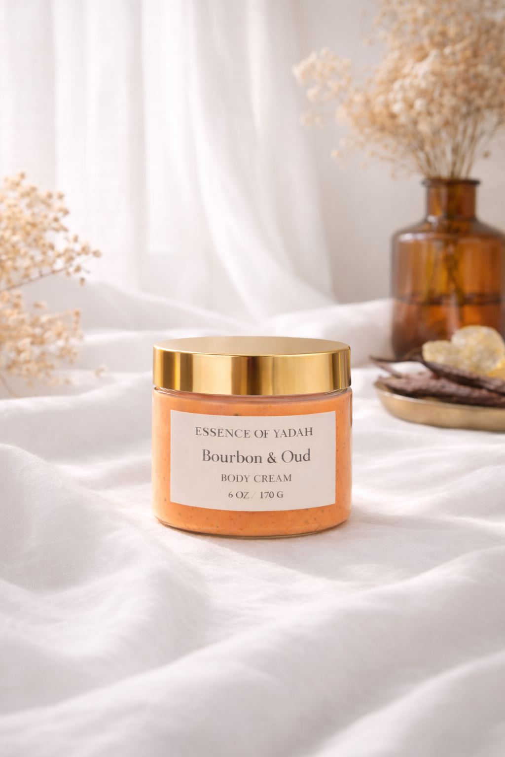 Bourbon & Oud body cream on  white linen background Essence of Yadah