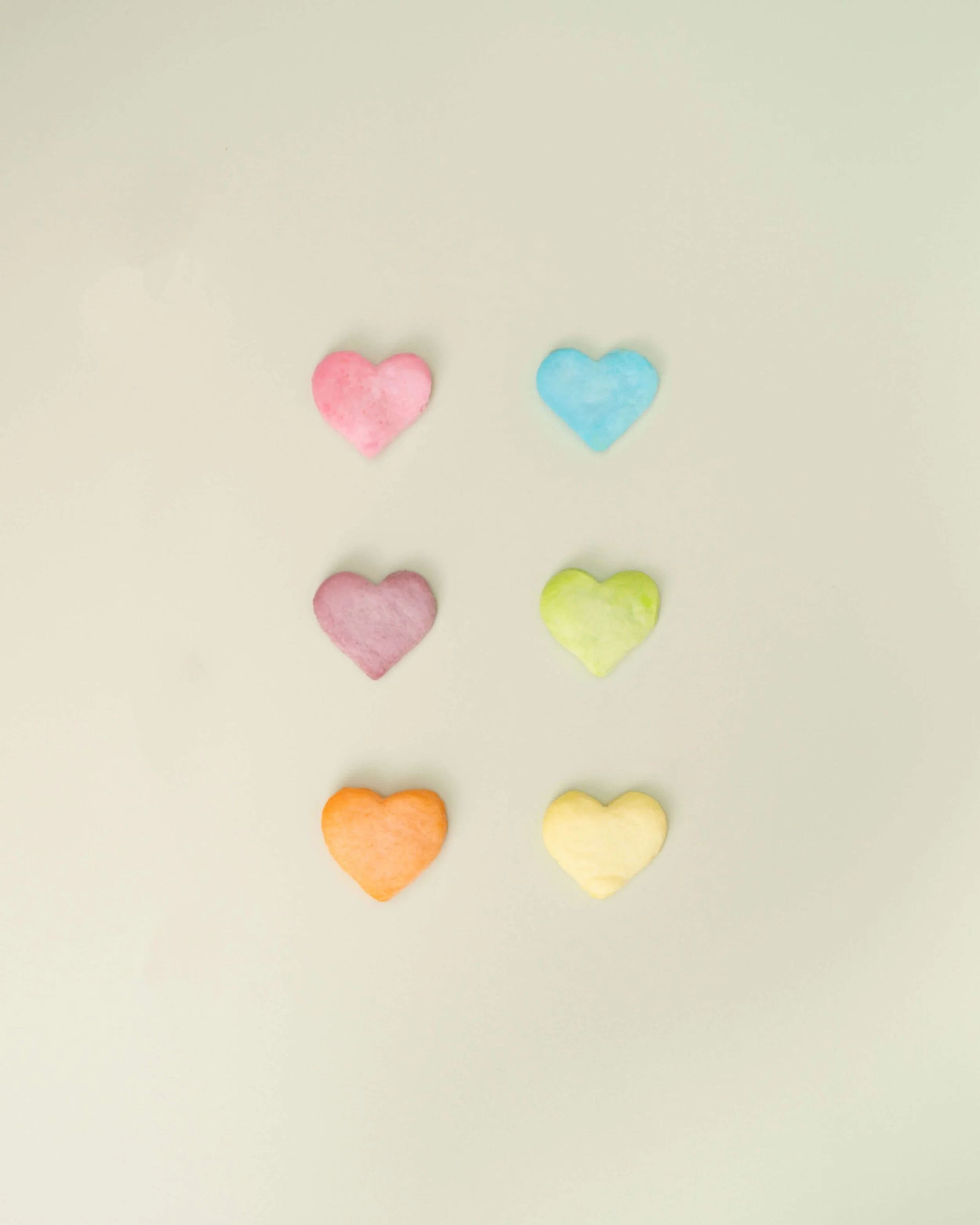 Columns of multi-color cotton candy hearts